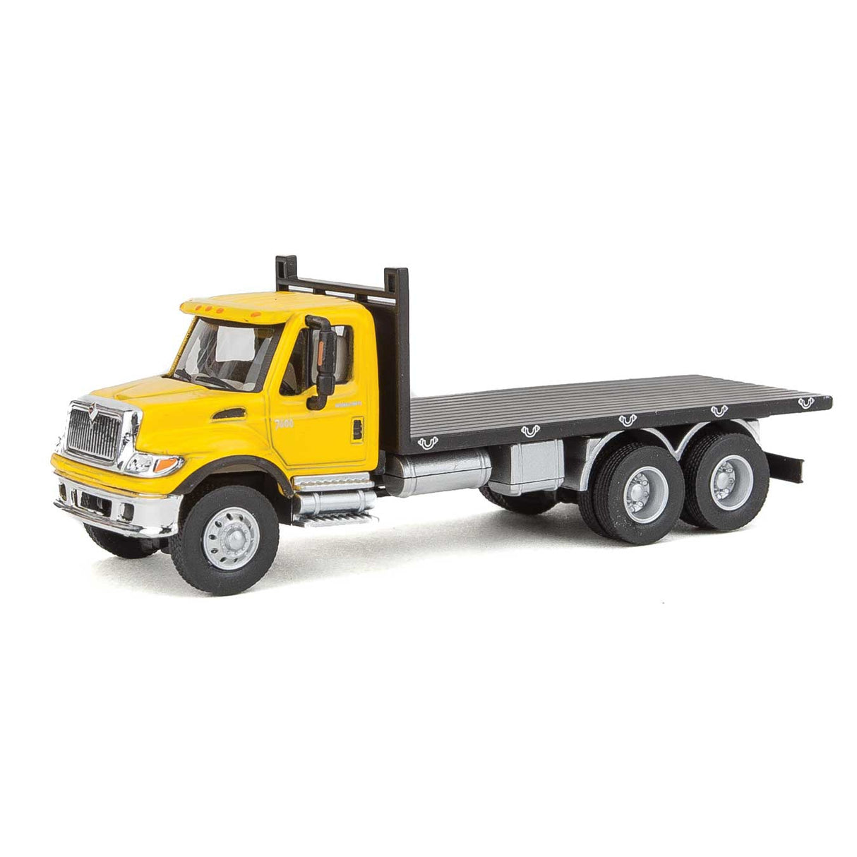 Walthers International(R) 7600 3-Axle Flatbed Truck - Assembled -- Yellow Cab, Black Flatbed