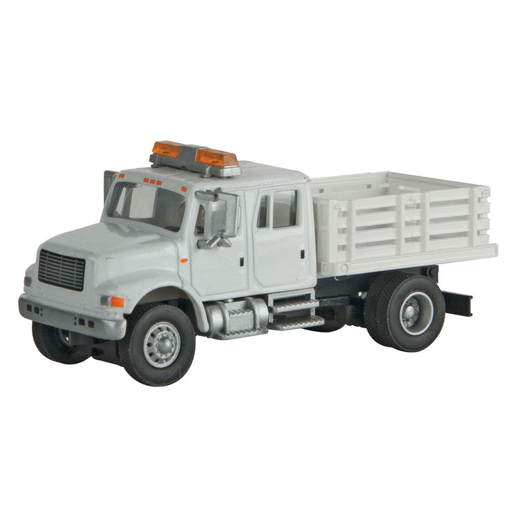 Walthers International(R) 4900 Open Stake Bed Utility Truck - Assembled -- White w/Railroad Maintenance-of-Way Logo Decals