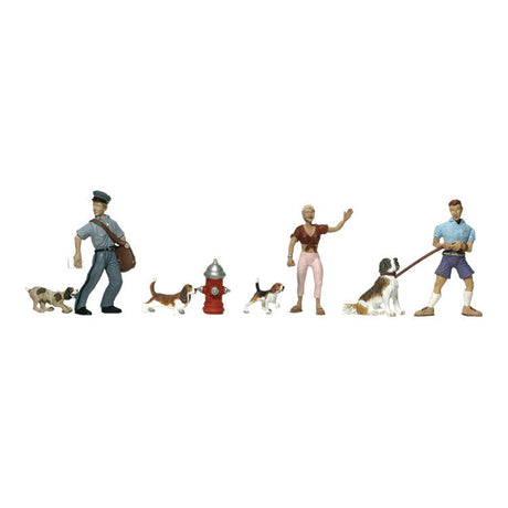 People & Pets - HO Scale - This set includes a mailman, a man and a woman in various 'canine' situations, four dogs and a fire hydrant