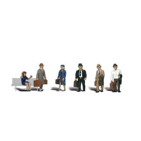 Travelers - HO Scale - One female sits and waves, while another walks carrying her luggage