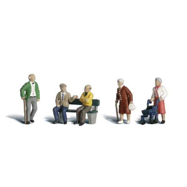 Senior Citizens - HO Scale - A man and a woman sport canes, a woman uses a walker and two men sit on a park bench