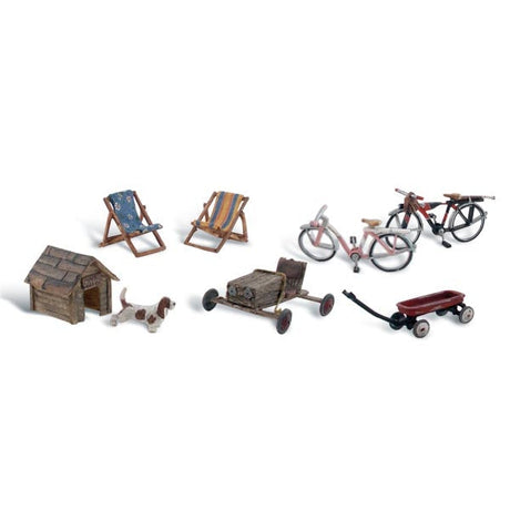 Backyard Basics - HO Scale - What&rsquo;s a backyard without bicycles, lawn chairs, toys and a little pup and his doghouse